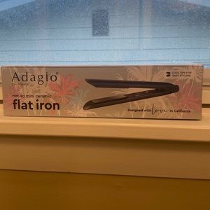Brand new Adagio not so mini ceramic flat iron. Never used